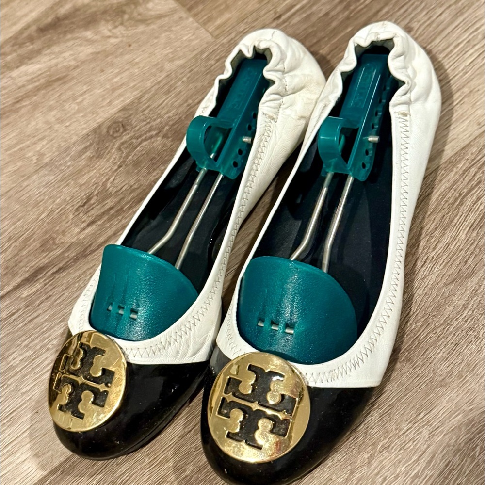 Tory Burch Black and White Flats with Gold Medallion